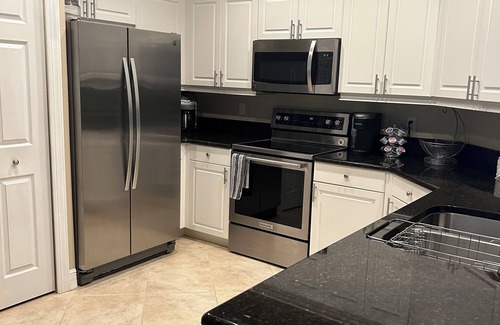 Eisenhower House | WOW! Stunning 3-Bedroom HEATED Pool Home: Your Private Oasis Awaits!