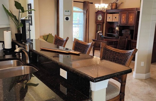 Eisenhower House | WOW! Stunning 3-Bedroom HEATED Pool Home: Your Private Oasis Awaits!