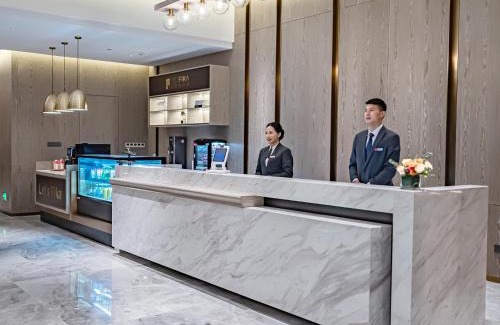 Fangcheng Hotel | Xiangyang Station Minfa World City Yishang Plus Hotel