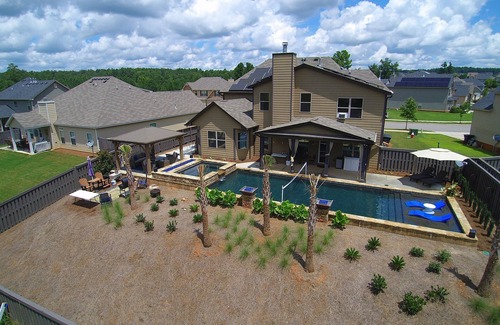 North Augusta House | Year round rental 4 miles from the Augusta National pool Hot tub Gym tanning bed