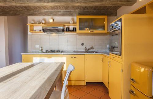 Le Cure Apartment | Yellow Home by MMega