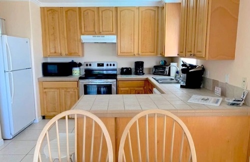 Cudjoe Key House | Yellow Home - Receive 400 dollars ntowards a BOAT RENTAL!