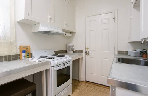 Medford Apartment | Your easy urban base in Medford! This comfortable Studio includes a King bed, free parking, and a full kitchenette. Steps from downtown dining and entertainment.