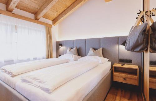 Kaprun Hotel | ZAGLGUT HOTEL-CHALETS Ski in Ski-out in winter, air conditioning in summer
