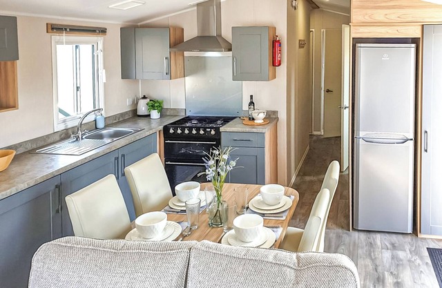 12ft-wide stylish and comfortable caravan with one double and one twin.