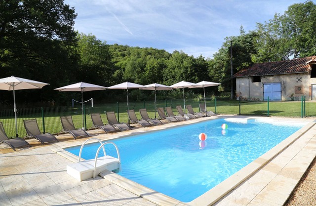 12th Century Chateau midst 20 acres bordered by river, with private pool