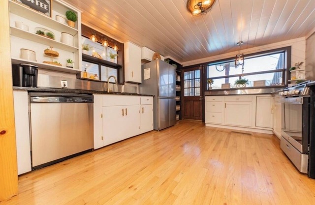 2 Homes 1 Property. 5 BR 3 BA POOL! Plenty of parking.