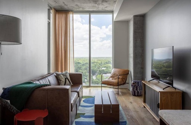 20th floor condo with pool on Rainey Street by Locale