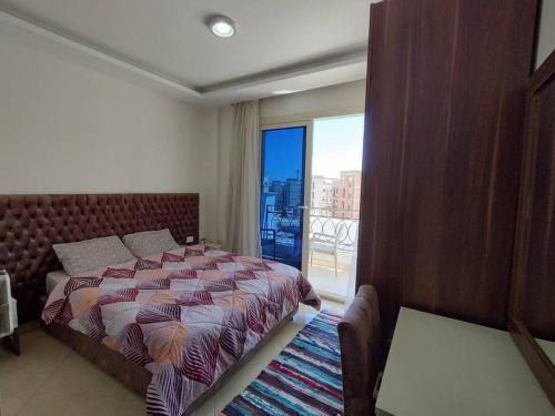 3-Bedroom Apartment on the Third Floor with 3 Balconies and lovely Pool View, Street View and Free Beach Access in Sharm Hills Resort