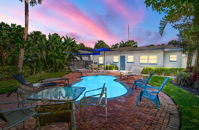 4-Bed Coastal Retreat: Heated Pool, 200 Steps to Beach, Walk to Fun!