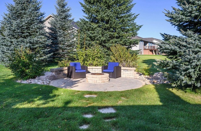 4-bedroom townhome in a quiet, upscale neighborhood with a private deck and yard