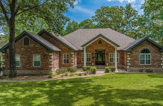 5-Bedrooms on the water! 2 Kitchens, Hot Tub, and Theatre!