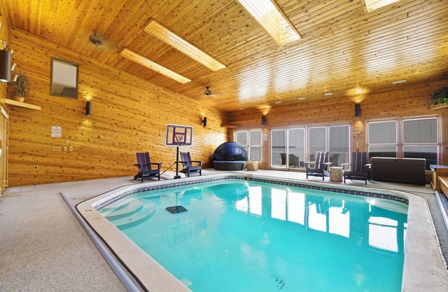 6BR Houghton Lake House w/Indoor Pool, Hot Tub, and Golf Simulator - Sleeps 24