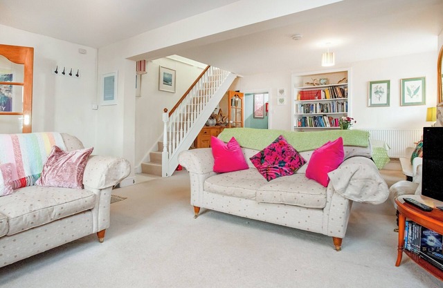 A beautiful and very spacious Cornish stone cottage with superb estuary views.