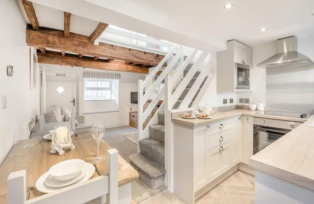 A charming one bedroom cottage oozing character and charm with a hot tub
