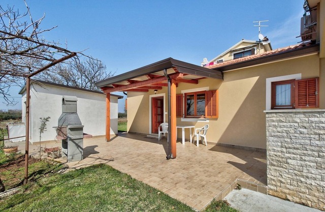 A ground floor apartment with 1 bedroom, terrace and garden - Mima 1