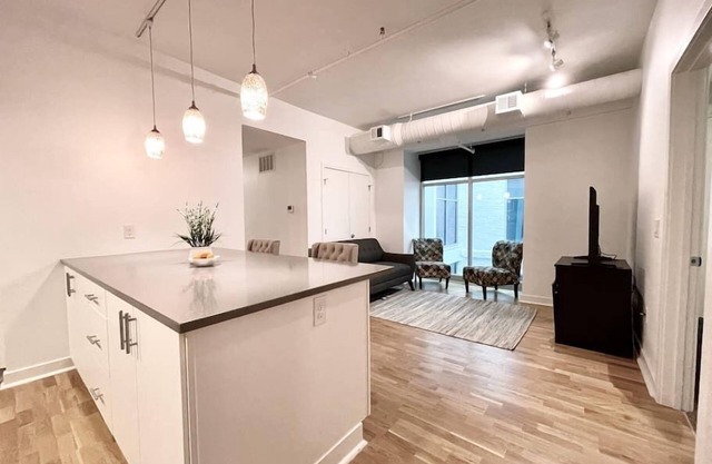 A historic 1,000 square foot Atrium loft in the heart of the Old Market