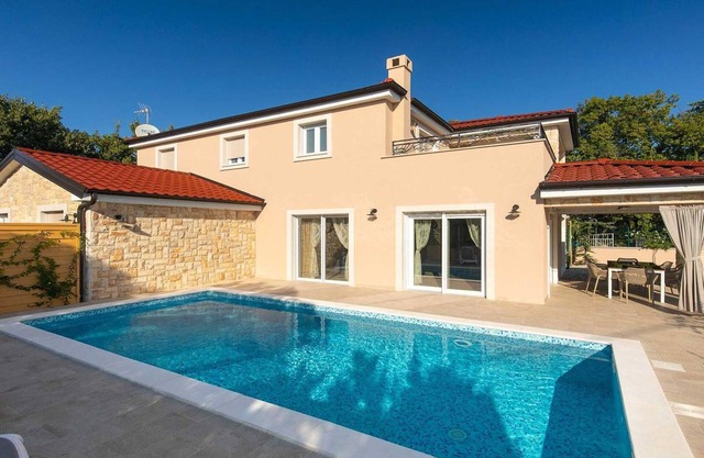 A modern poolside villa on the island Krk