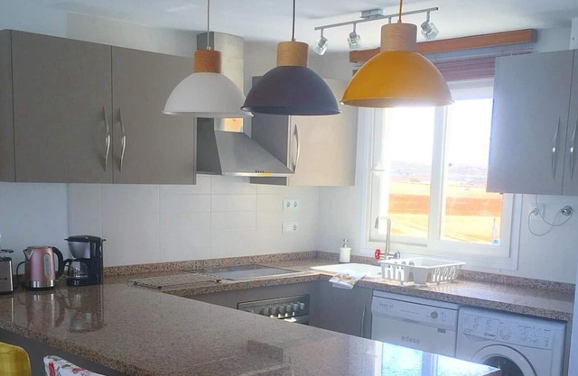 A penthouse with amazing views of the mountains and Jack Nickalaus Golf Course.