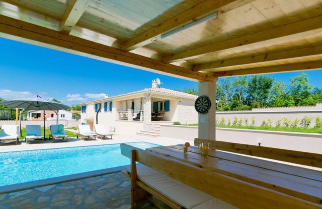 A spacious four-bedroom villa with sauna and private pool