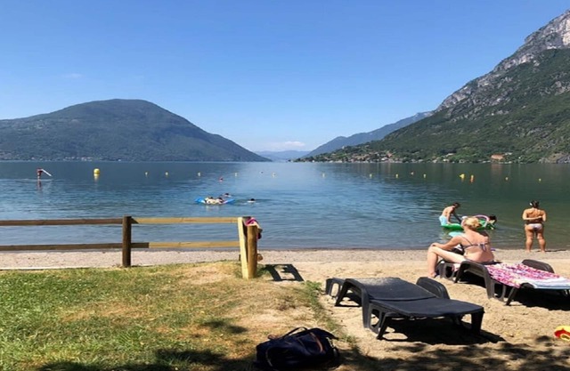 A THREE-STORY VILLA OVERLOOKING THE VEZIO CASTLE &LAKE LUGANO,ITALIAN SIDE