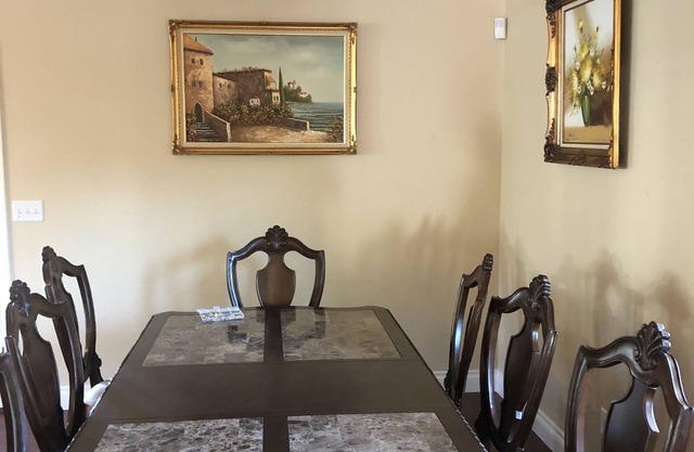 A warm home environment secluded in the woods yet 5 minutes from downtown.