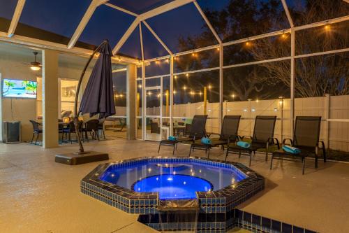 A Wave From it All! Pet friendly, Private heated pool home with fire pit!
