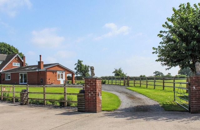 A wonderful single level property set within a working equestrian setting.
