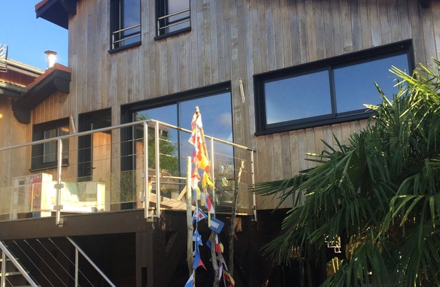 Adorable wooden house with swimming pool on the coastal path