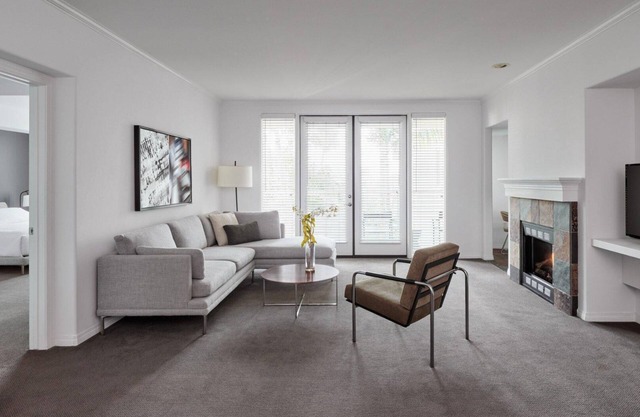 AKA Residences Sharply Appointed Suite w/Kitchen, Den Space, Patio, & WiFi