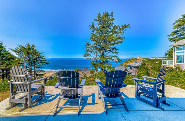 Amazing ocean-view escape with seven bedrooms, scenic patios, & modern interior