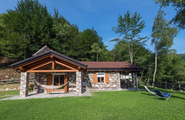 An oasis in the middle of nature: Tastefully furnished 3-room stone house with swimming pond