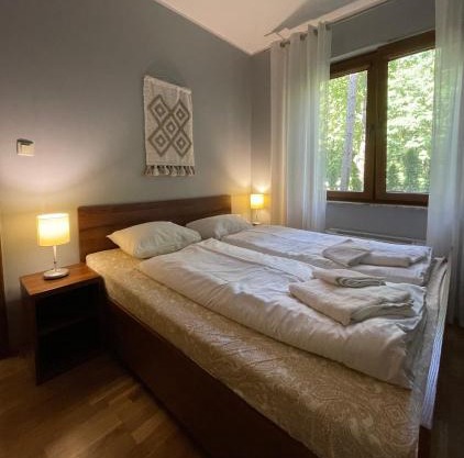 Apartament z ogródkiem, basen, garaż, rowery Willa 4 Pory Roku