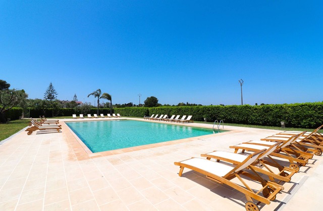 Apartment Bungalow Regina close to the Sea with Shared Pool & A/C