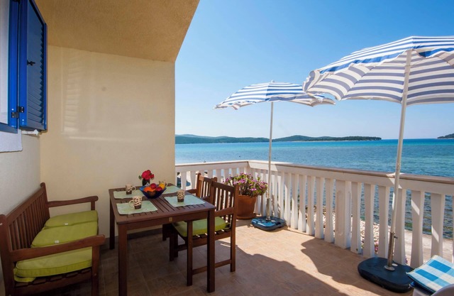 Apartment Grivicic A1 with Sea View on island Krapanj