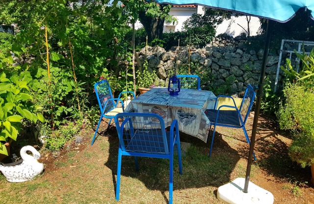 Apartment in a picturesque village with a garden