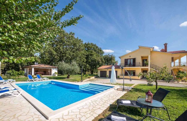 Apartment on the ground floor of a family house with pool