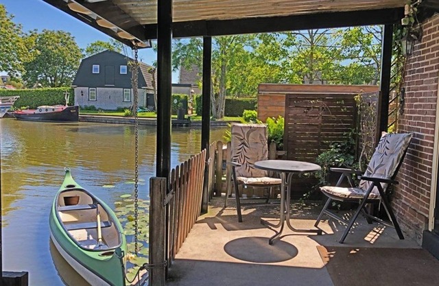 Apartment, right on the water. With a beautiful view of the canals and fields of the "kingdom of 1000 islands".