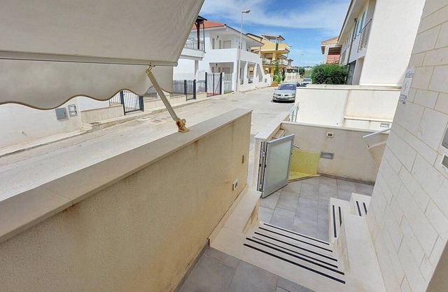 Appartamento Odisseo D: A cozy apartment situated at a few steps from a sandy beach, with Free WI-FI.