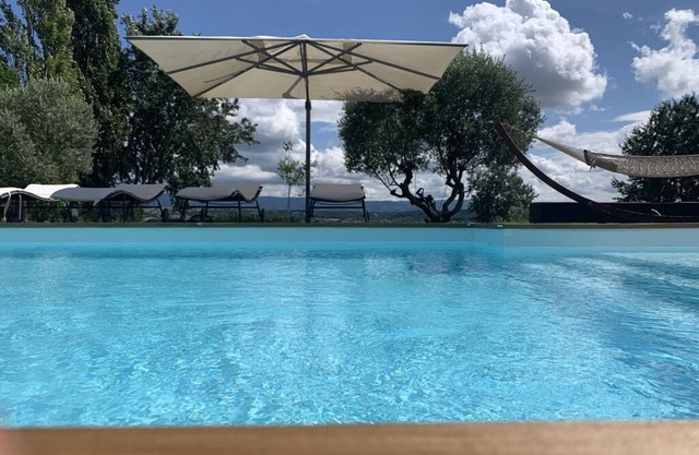 Architect-designed house set in 2 hectares of grounds with heated pool and spa
