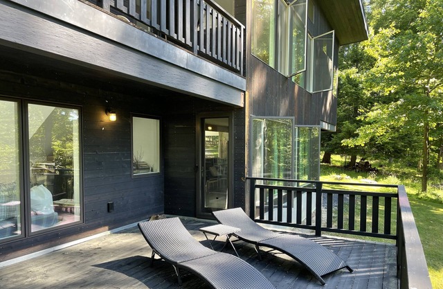 Architectural Modern escape tucked in a quiet wooded neighborhood