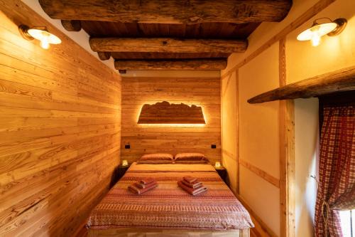 B&B immerso nel bosco con area benessere esclusiva nel cuore delle montagne - IDUEVAGAMONDI