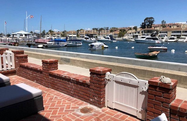 BALBOA ISLAND WATERFRONT . STEPS TO THE SAND