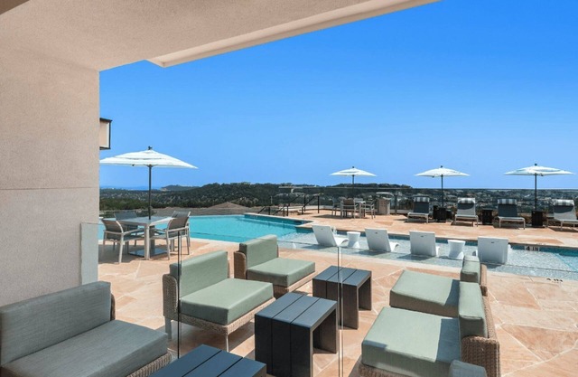 Barsala l Tranquil 1BD: Poolside Luxury, Smart Home Features