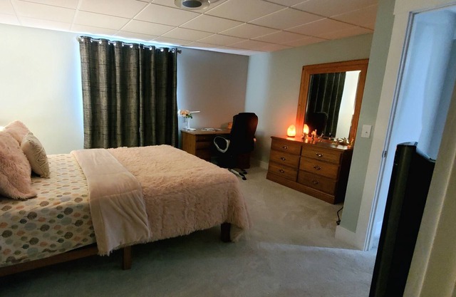 Basement Space with bedroom, living room, movie theatre and gym.