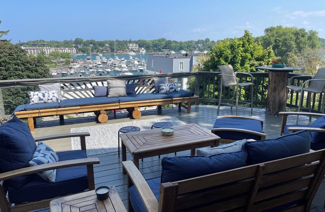 Be in the heart of Charlevoix overlooking the harbor!