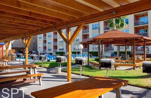 Beach access Condo Nice pool/hot tub area w/bbq 2 Bedroom Home by RedAwning