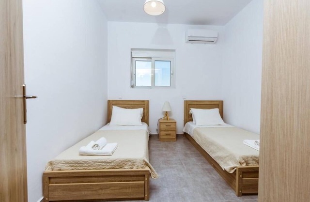 Beach front,quiet big apartment in western Crete pool + hot tub , bbq