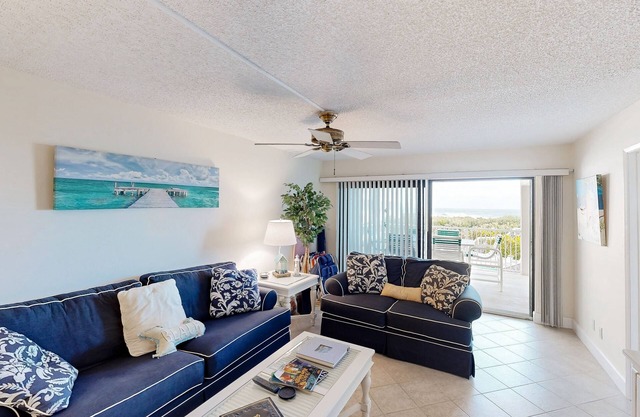 Beachfront condo with ocean views, pool, sundeck, & private balcony