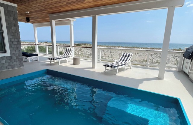 Beachfront with in-deck saltwater pool, panoramic views and private beach access